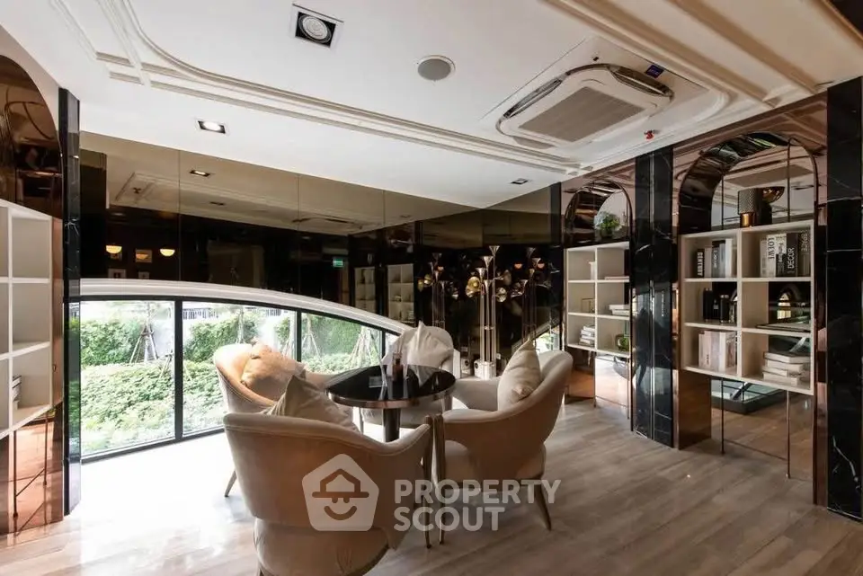 Luxurious living room with elegant decor and garden view, featuring plush seating and modern design elements.