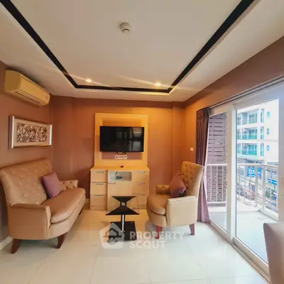 Modern living room with stylish furniture and balcony access in luxury apartment
