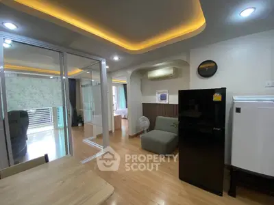 Modern open-layout apartment with stylish lighting and sleek furnishings