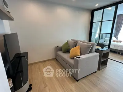 Modern living room with sleek design and cozy sofa in a stylish apartment