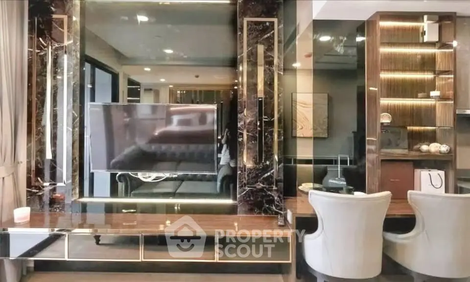 Luxurious modern living room with elegant decor and built-in TV unit