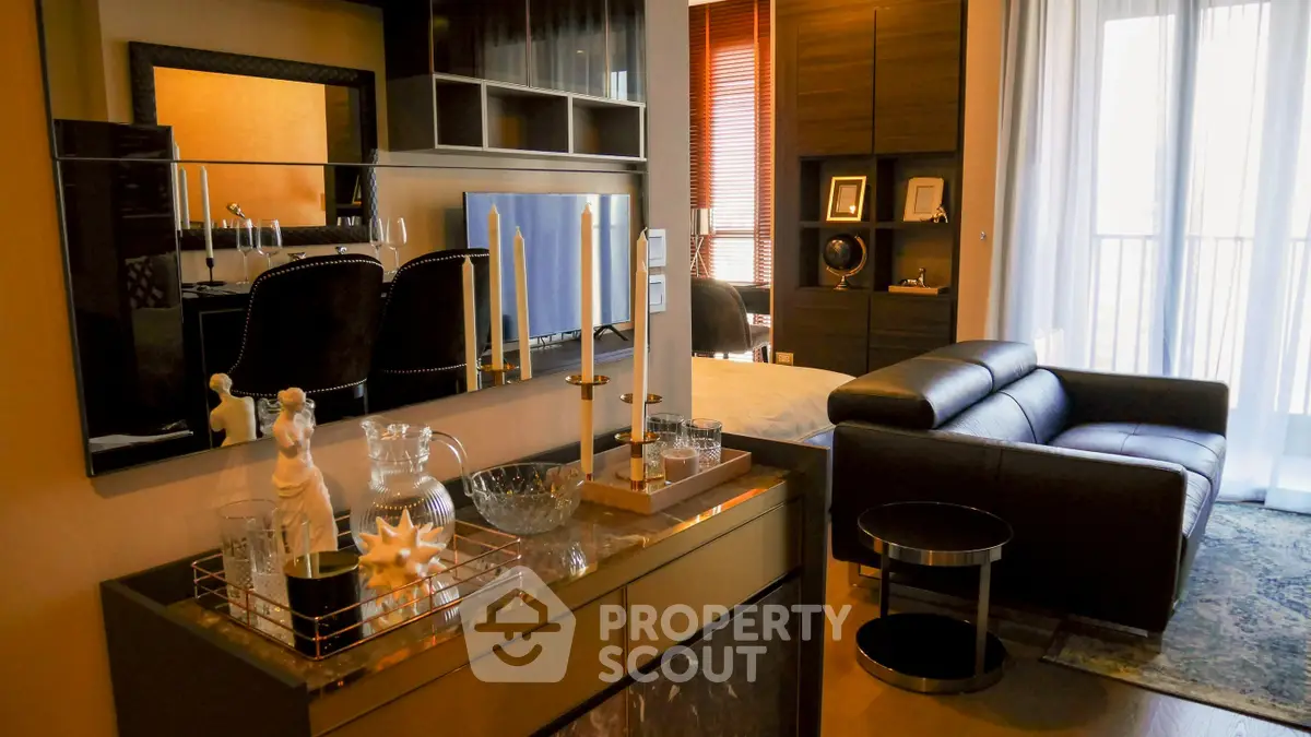 Luxurious modern living room with elegant decor and stylish furniture, featuring a cozy seating area and chic accessories.