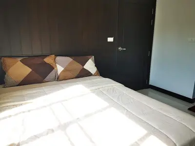 Cozy bedroom with modern decor and natural light