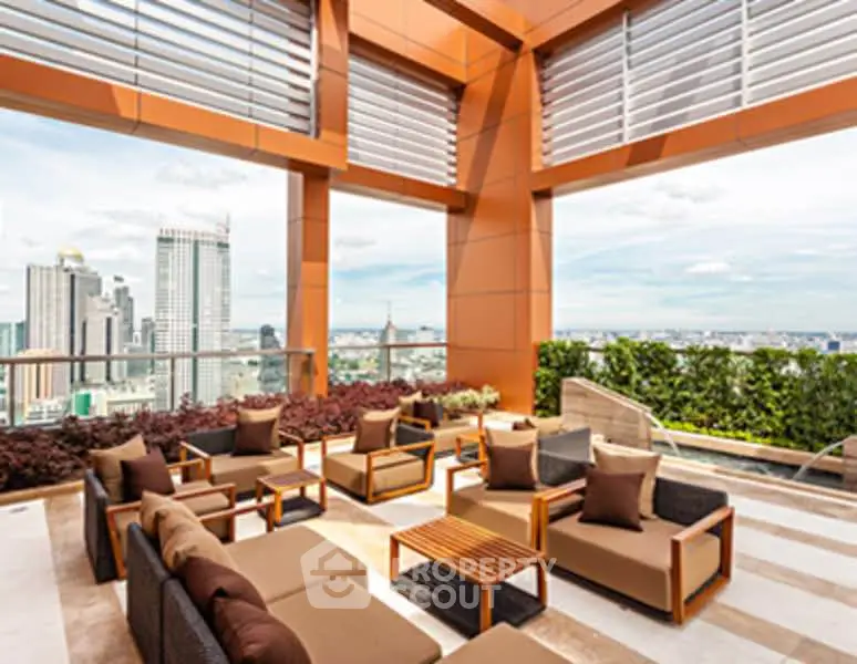 Luxurious rooftop terrace with stunning city skyline view and elegant outdoor seating.