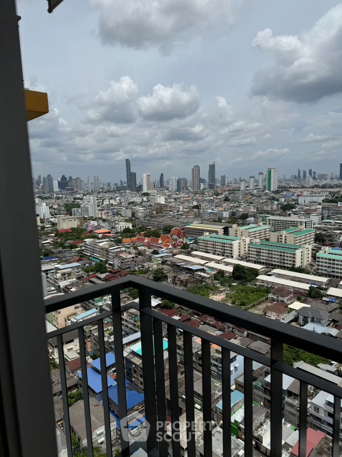 Stunning cityscape view from high-rise balcony in urban skyline