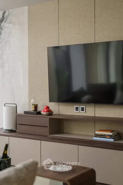 Modern living room with sleek TV setup and stylish decor