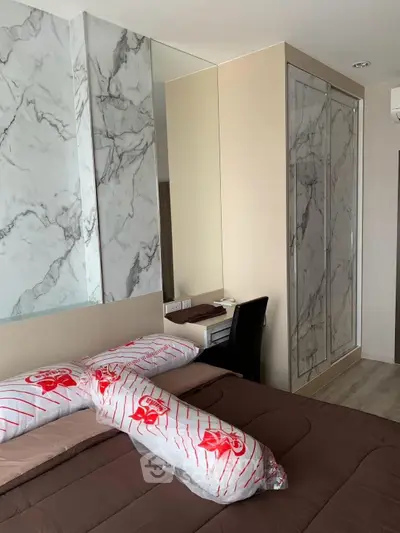 Modern bedroom with marble accents and sleek design