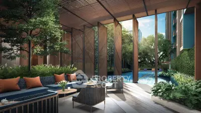 Luxurious outdoor pool area with stylish seating and lush greenery