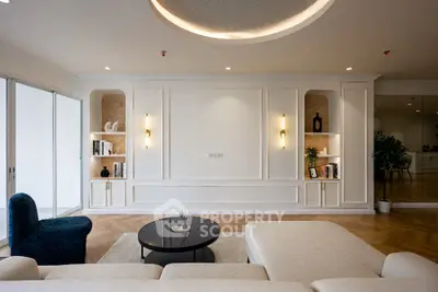 Luxurious modern living room with elegant decor and built-in shelving