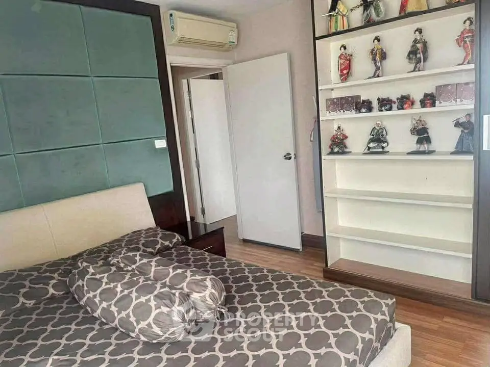 Cozy bedroom with stylish decor and unique display shelves