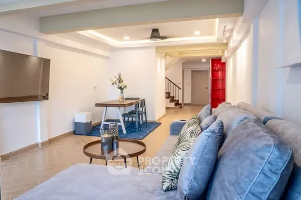 Spacious modern living room with stylish decor and open layout