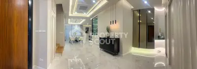 Luxurious modern living room with elegant dining area and stylish lighting