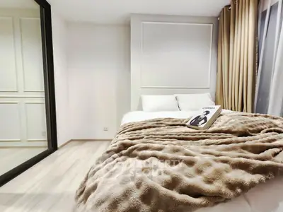 Cozy modern bedroom with plush bedding and elegant decor
