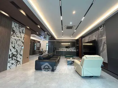 Luxurious modern living room with sleek design and spacious layout, featuring elegant furniture and ambient lighting.
