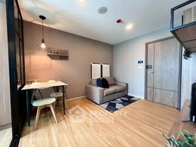 Modern living room with stylish decor and cozy seating area