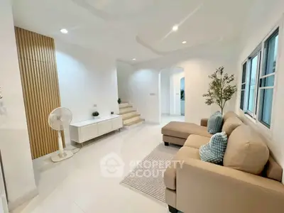Spacious modern living room with stylish decor and natural light