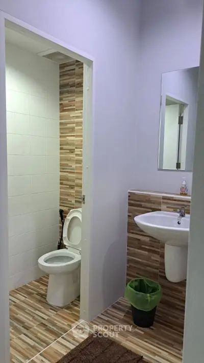 Modern bathroom with stylish tile design and sleek fixtures
