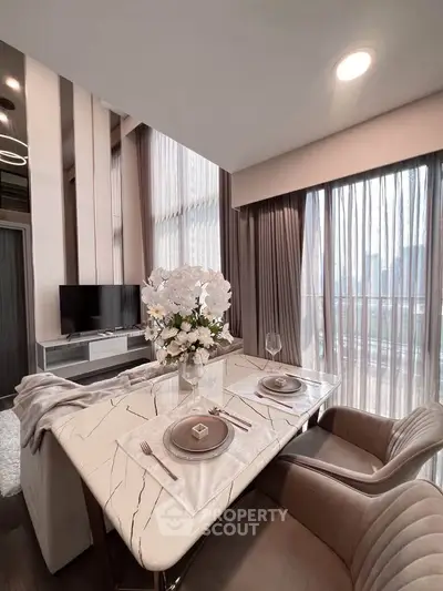 Elegant dining area with modern decor and large windows offering city views