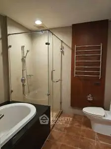 Luxurious modern bathroom with glass shower and bathtub