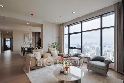 Luxurious living room with panoramic city view and elegant modern furnishings.