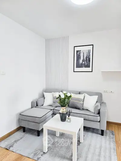 Chic modern living room with stylish gray sofa and elegant decor
