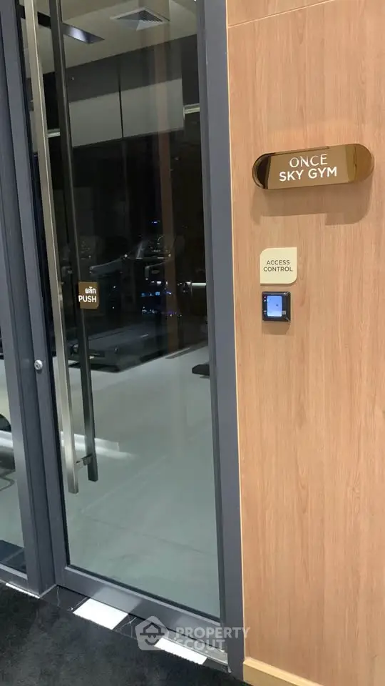 Modern gym entrance with access control in luxury building