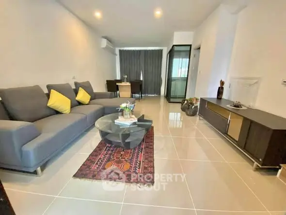 Spacious modern living room with sleek furniture and stylish decor