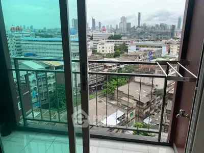 High-rise apartment balcony with stunning city skyline view