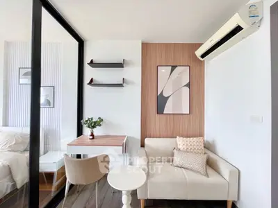 Modern compact living room with stylish decor and air conditioning