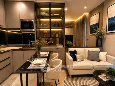 Modern open-layout kitchen and living room with elegant decor and ambient lighting