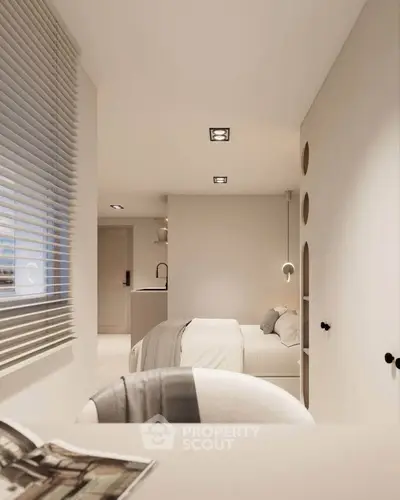 Modern minimalist bedroom with neutral tones and stylish decor