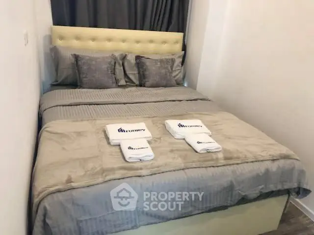 Cozy bedroom with plush bedding and elegant decor