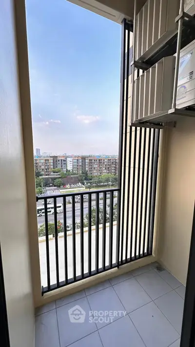 Charming balcony with city view, perfect for relaxation and enjoying the skyline.