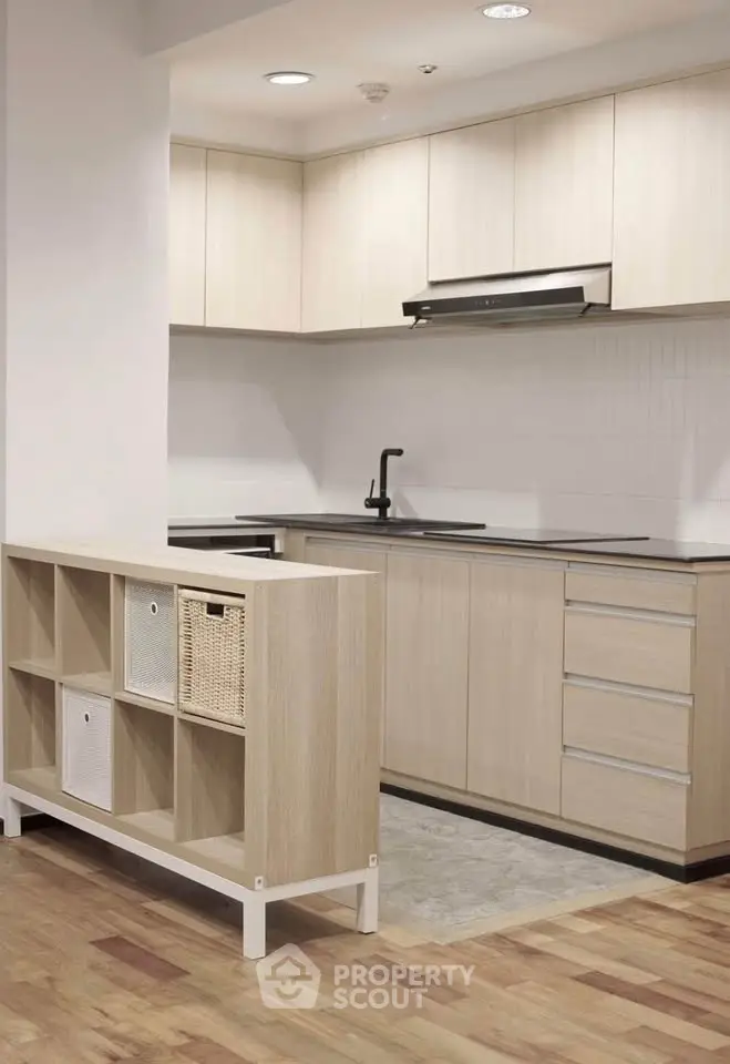 Modern kitchen with sleek cabinetry and open layout design