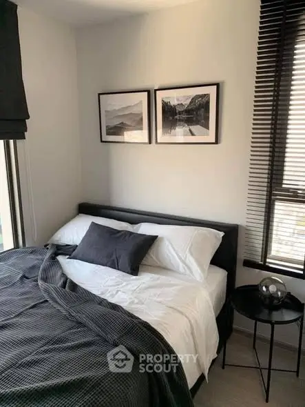 Cozy bedroom with modern decor and natural light