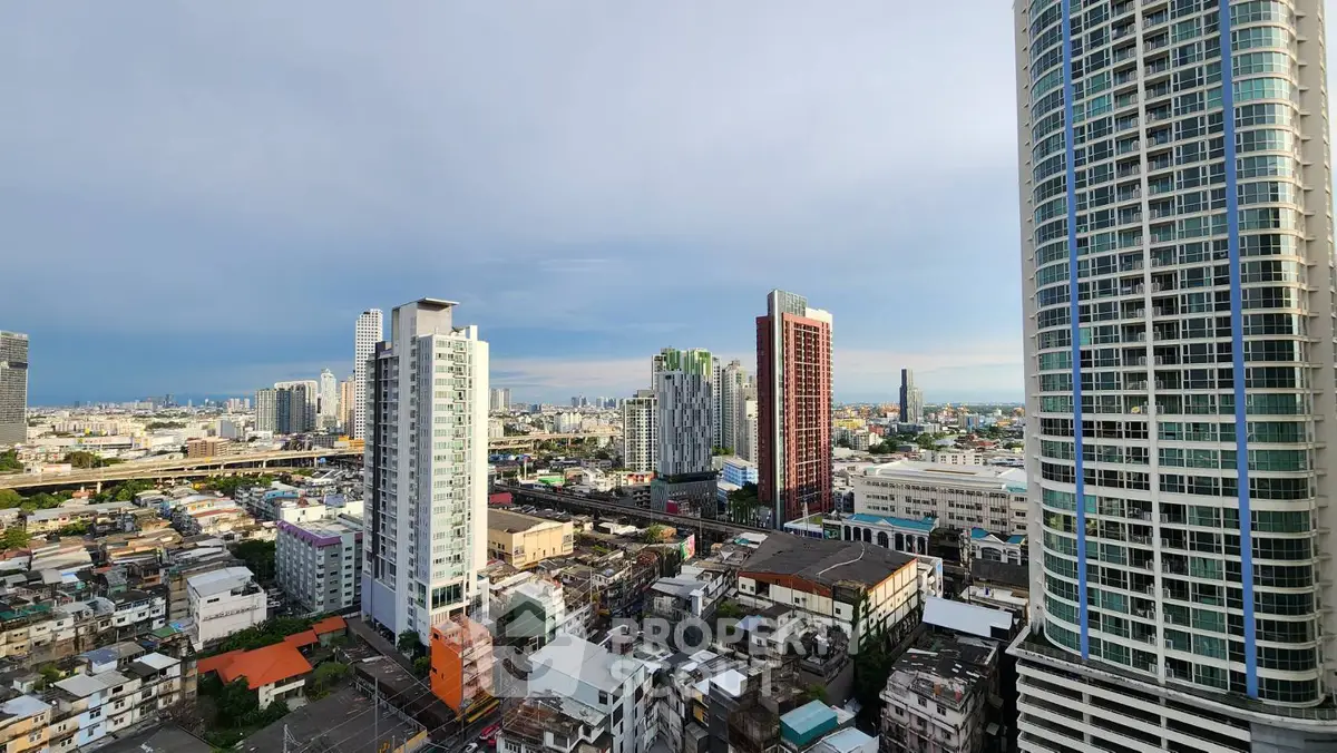 Stunning cityscape view with modern high-rise buildings and clear sky.