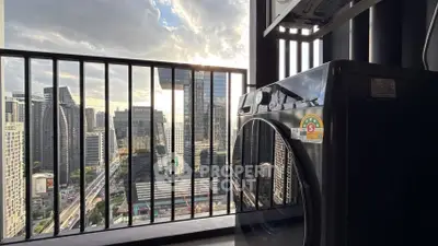 Modern city view from balcony with washing machine, perfect urban living setup.