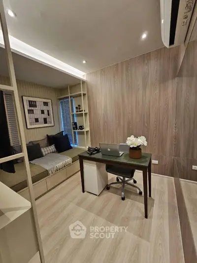 Modern study room with sleek desk and cozy seating area, perfect for productivity and relaxation.