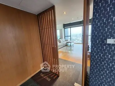 Stylish modern apartment entrance with wooden accents and city view