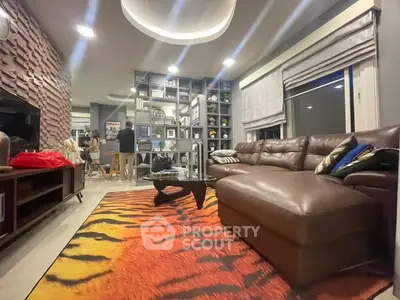 Stylish living room with modern decor and vibrant tiger rug