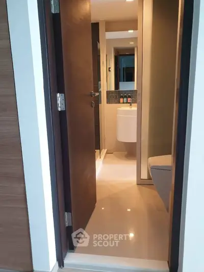 Modern bathroom with sleek design and elegant fixtures in a contemporary apartment.