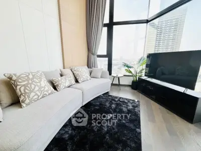 Luxurious modern living room with panoramic city view and stylish decor