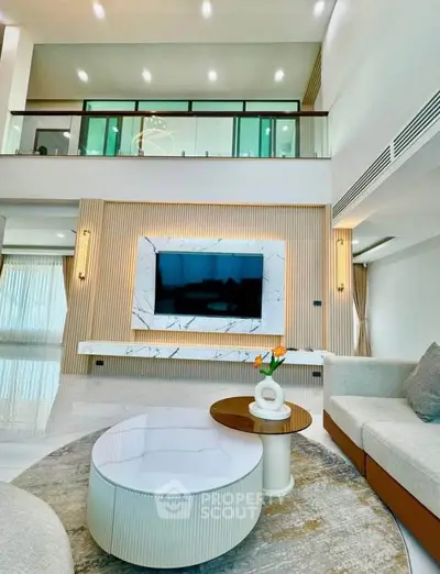Luxurious modern living room with high ceilings and elegant decor
