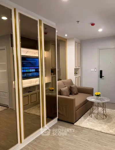 Modern living room with elegant decor and cozy seating area