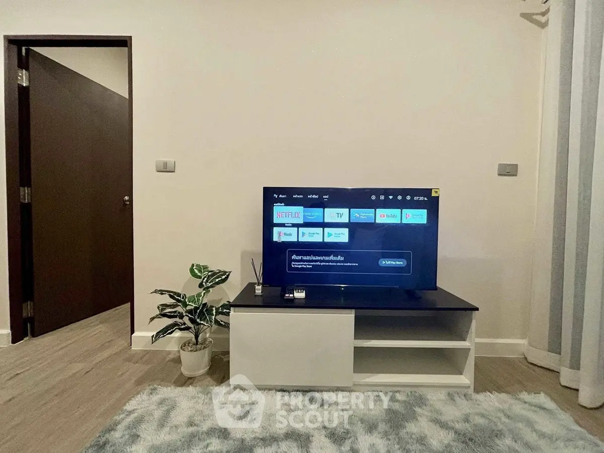 Modern living room with smart TV and stylish decor