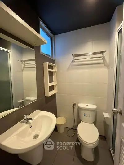 Modern bathroom with sleek fixtures and natural light