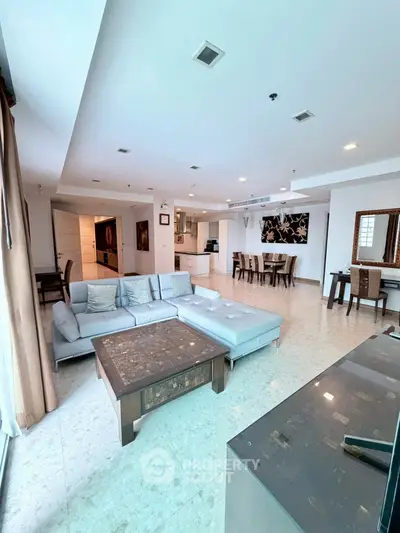 Spacious modern living room with elegant furniture and open layout