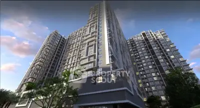 Stunning modern high-rise building with sleek architecture and lush greenery, perfect for urban living.