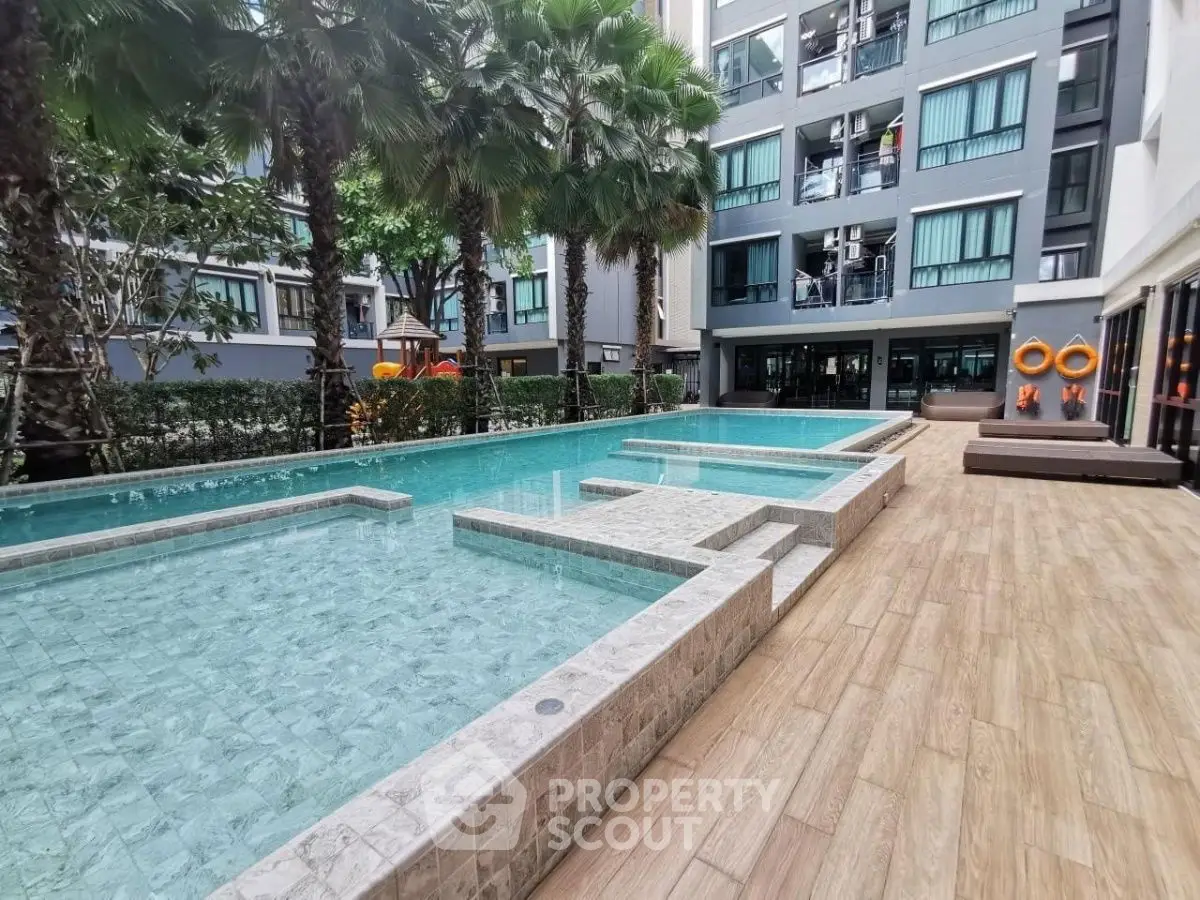 Luxurious apartment complex with stunning pool and modern design