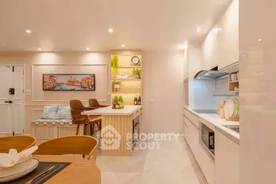 Modern kitchen with open layout and stylish dining area